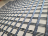 ผนังและทางลาดเสริมแรงโพลีเอสเตอร์ PET Uniaxial Geogrid